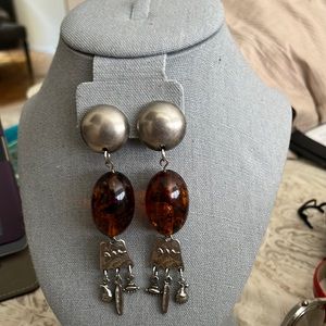Silver clips with large amber beads